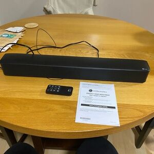 LG SK1-2.0 Channel Compact Soundbar, Bluetooth Compatibility, Wireless Subwoofer